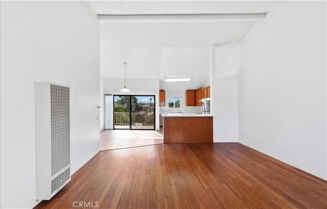 a view of a room with a sink and a window