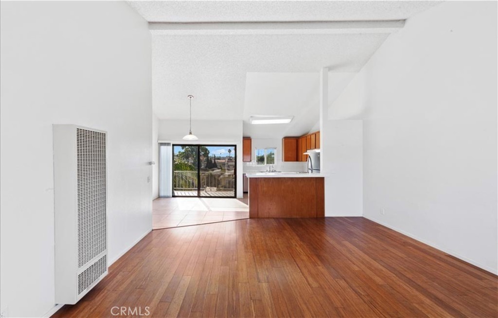1108 Termino Avenue Long Beach, CA 90804 - Photo 10 of 22 a view of kitchen and wooden floor