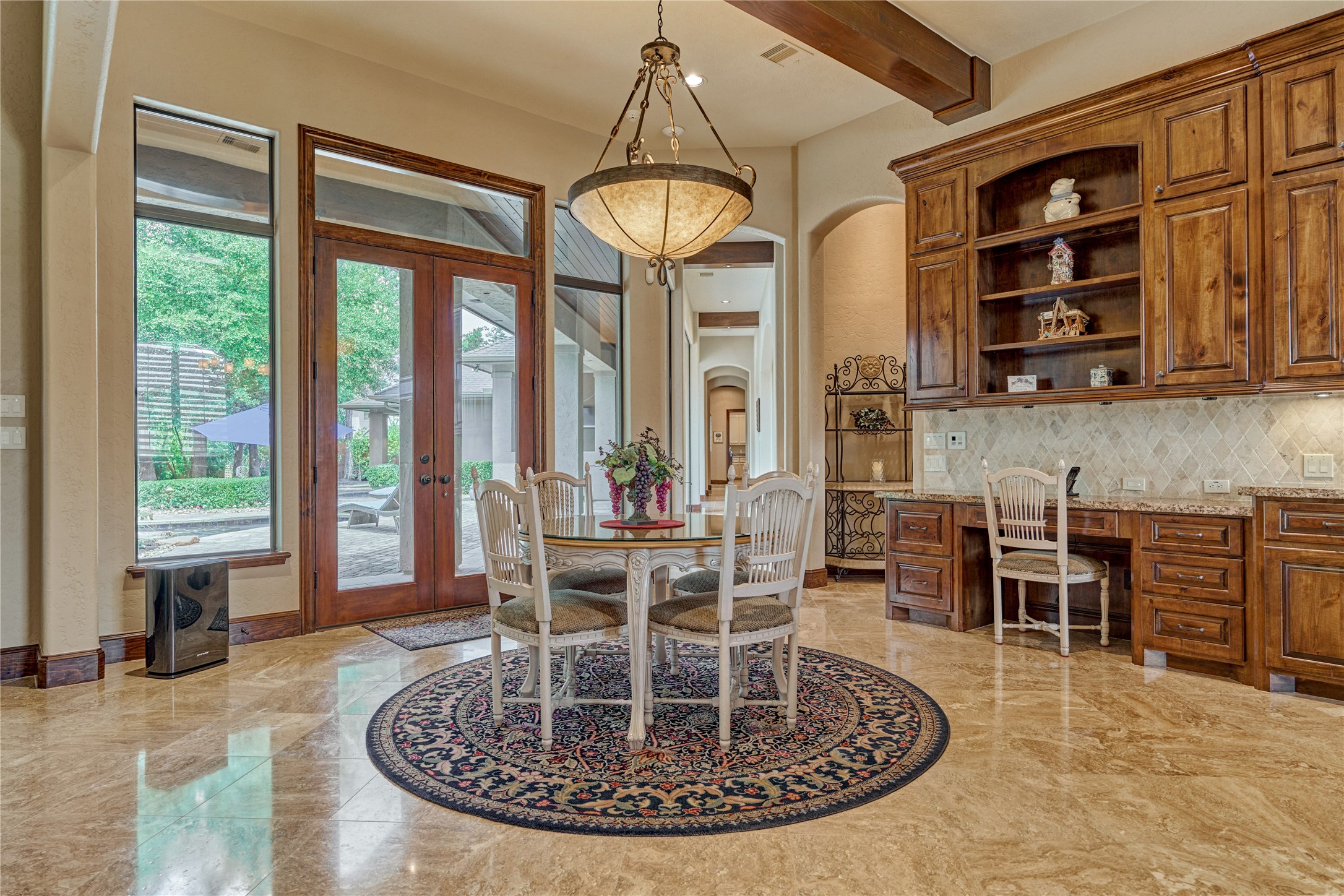24803 Pearl Crest Lane Spring, TX 77389 - Photo 17 of 50 The breakfast room offers a casual dining option. Note: the built-in desk with organizers—perfect as a study space or for at-home bill management.