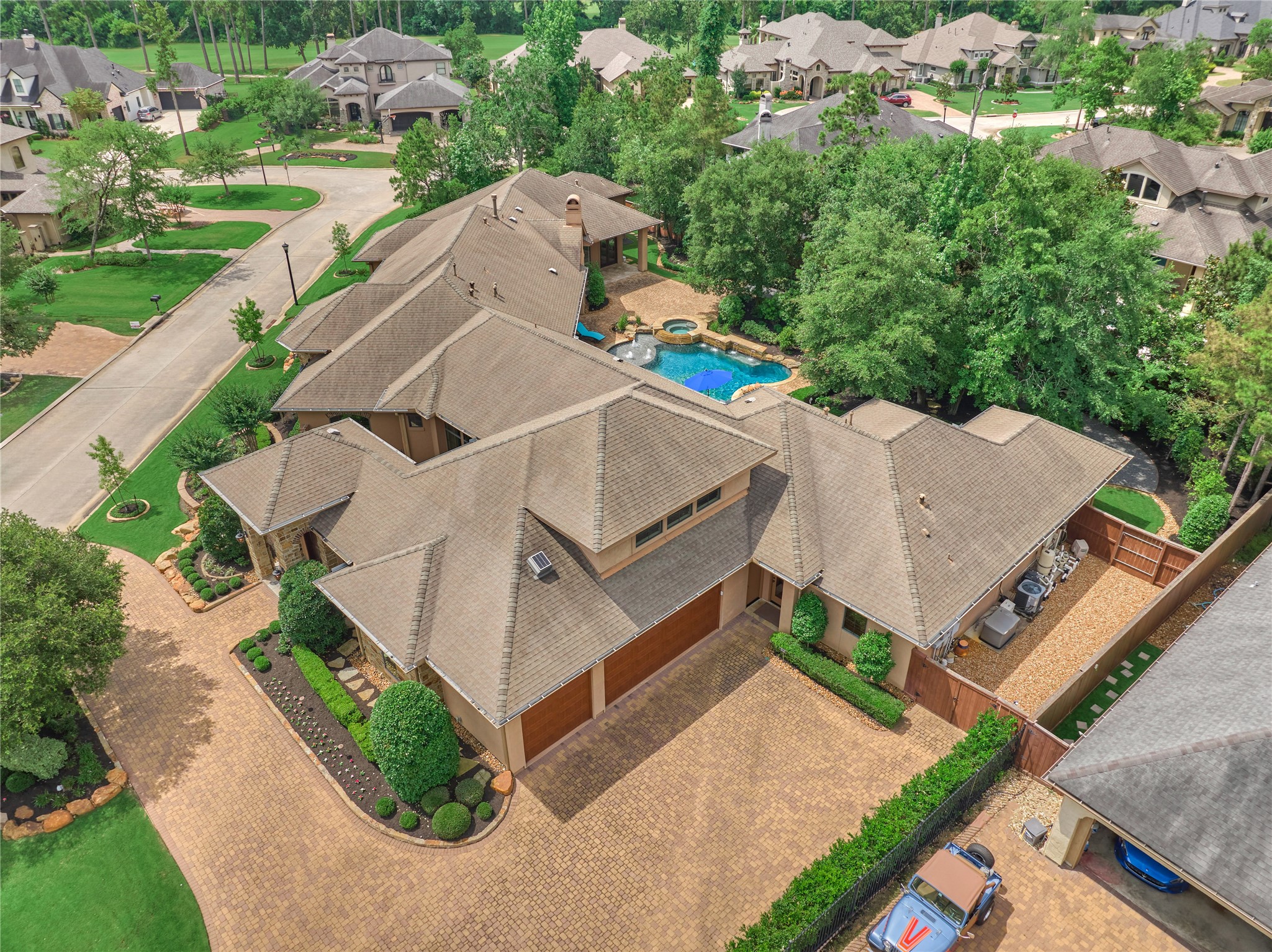 24803 Pearl Crest Lane Spring, TX 77389 - Photo 2 of 50 Roof was replaced in July 2025, after this photo was taken. Note: the whole-home generator!