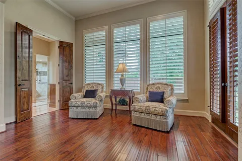 an aerial view of a house with a garden