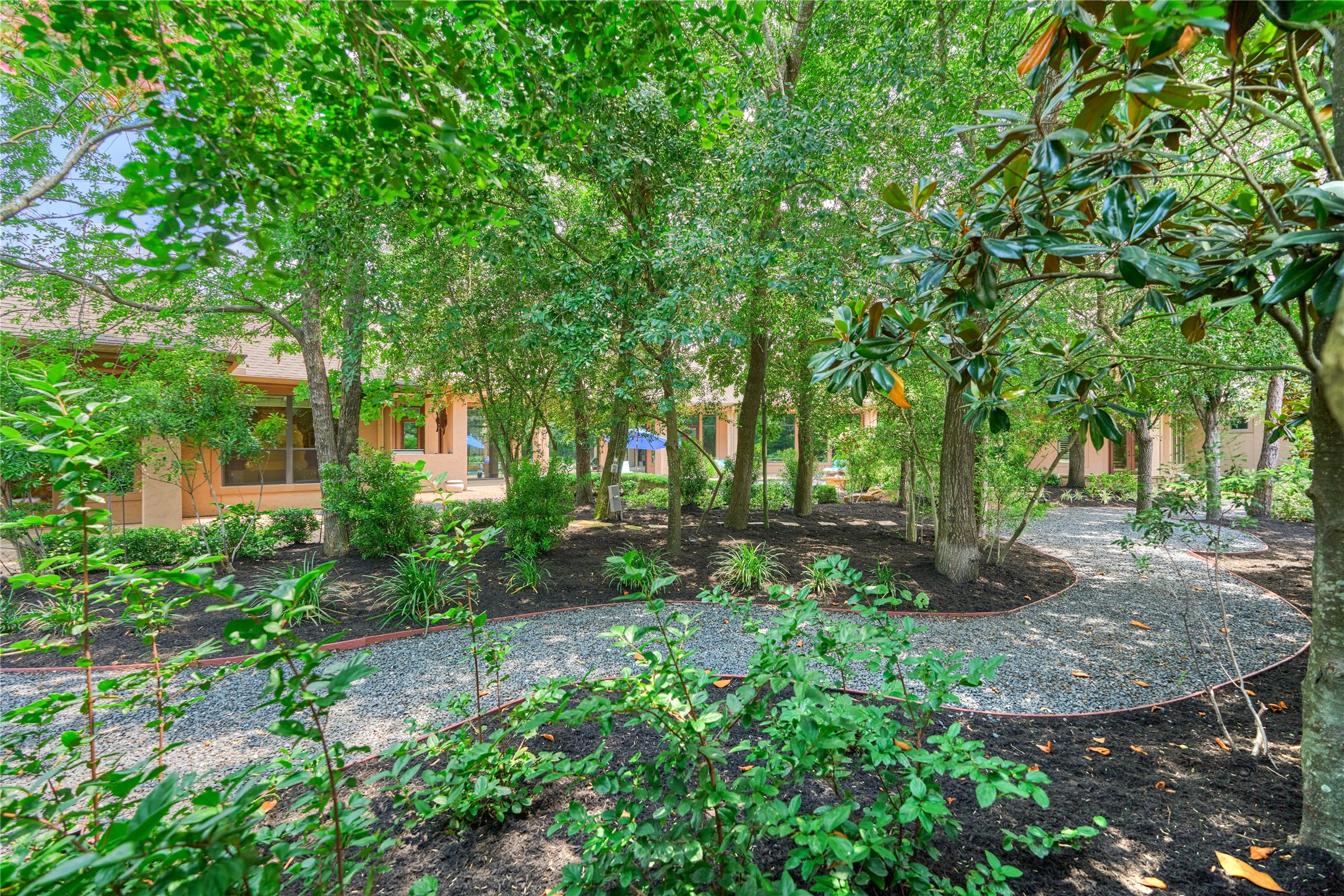 24803 Pearl Crest Lane Spring, TX 77389 - Photo 42 of 50 This marvelous backyard retreat features Black Star gravel walkways, creating peaceful, scenic pathways throughout the grounds.
