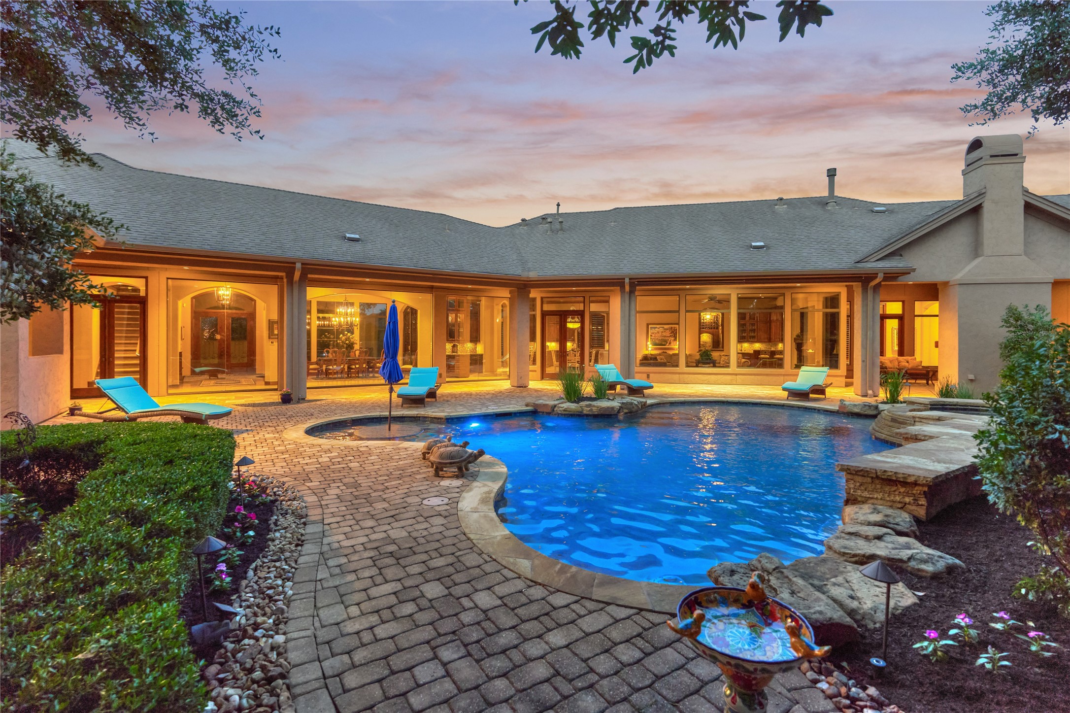 24803 Pearl Crest Lane Spring, TX 77389 - Photo 44 of 50 The saltwater pool & spa features high-efficiency pumps, two water features, LED lighting, an in-floor cleaning system, and a PebbleTec surface.