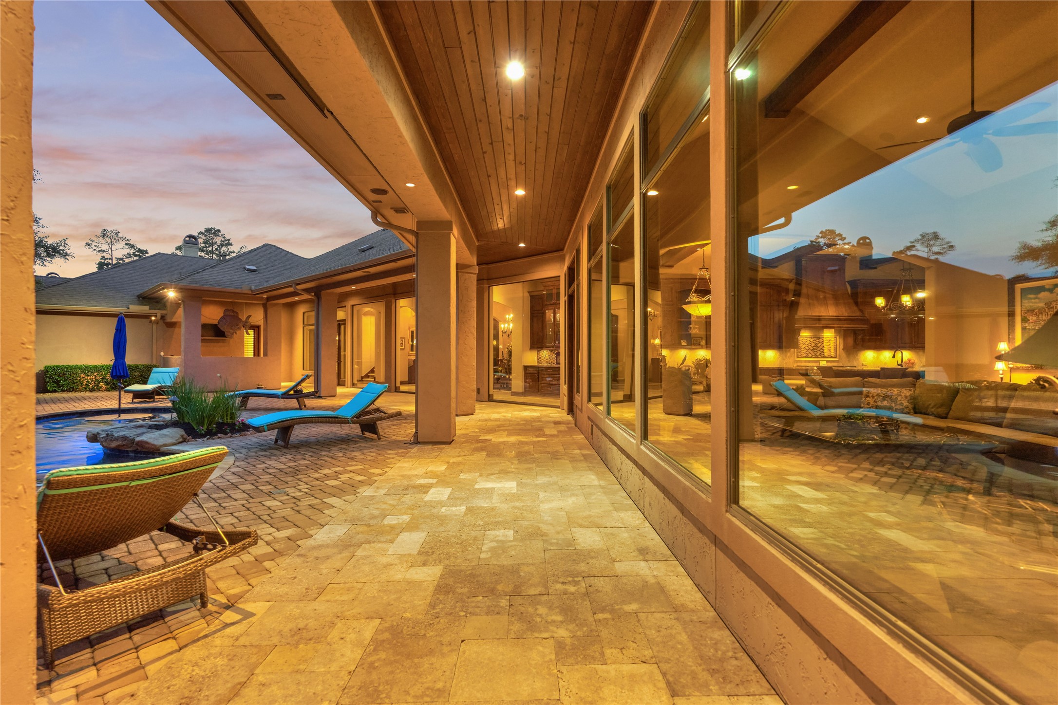 24803 Pearl Crest Lane Spring, TX 77389 - Photo 46 of 50 Travertine surface flows throughout the primary and rear lanai.