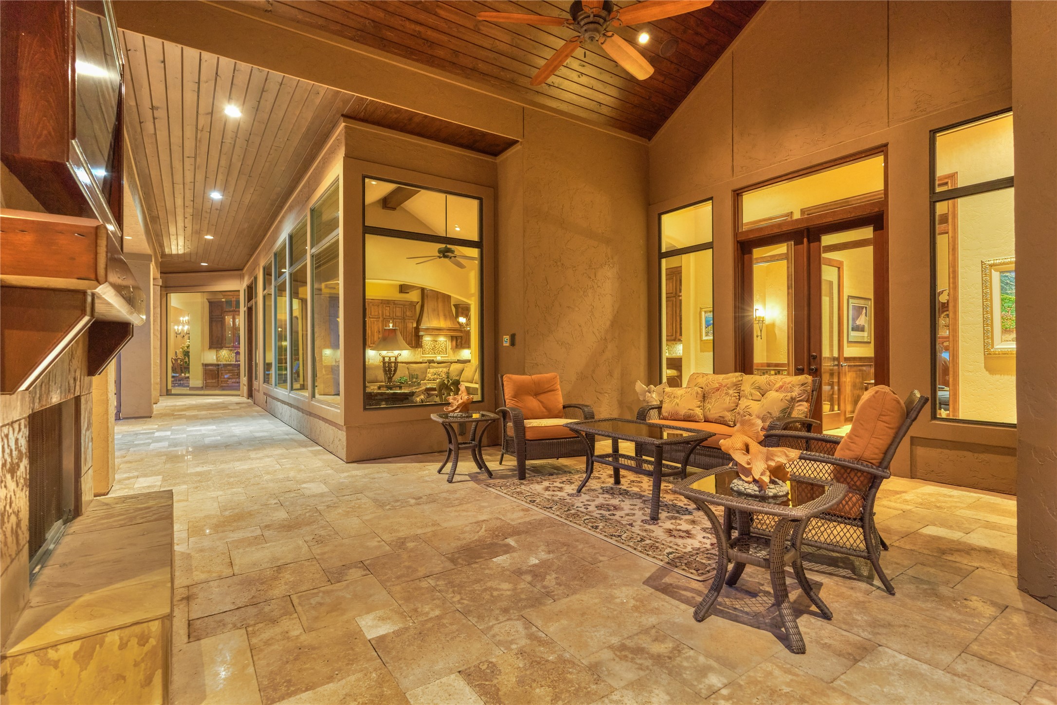 24803 Pearl Crest Lane Spring, TX 77389 - Photo 47 of 50 Covered outdoor living area with a cathedral ceiling and fireplace.