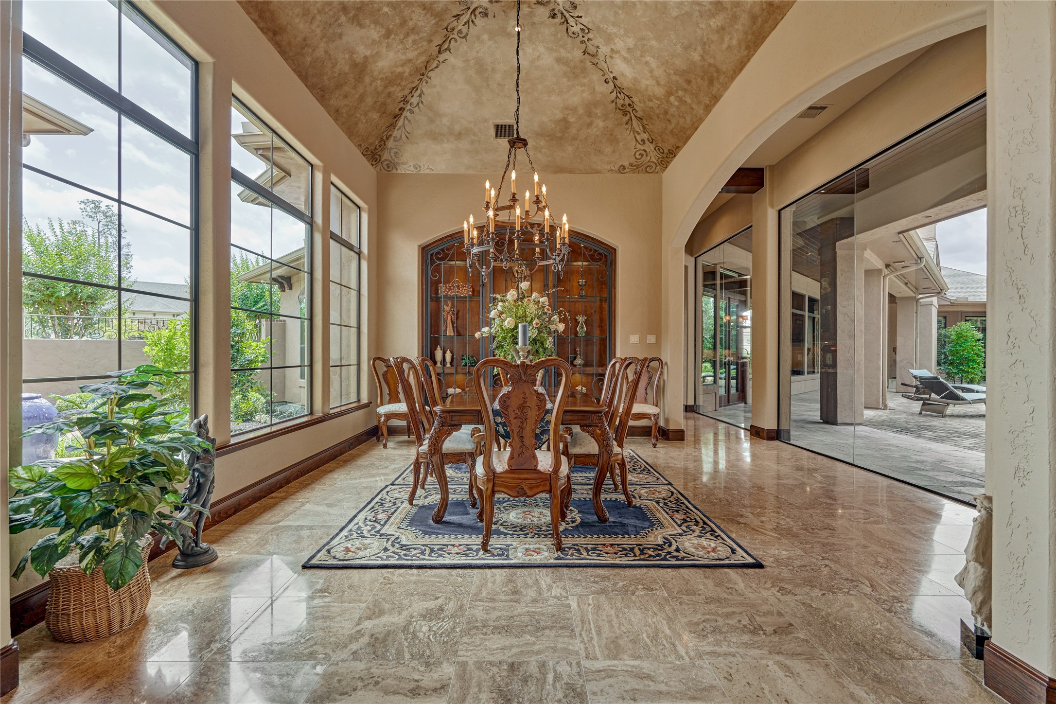 24803 Pearl Crest Lane Spring, TX 77389 - Photo 7 of 50 Formal Dining Room boasts a groin ceiling with custom faux paint treatments and is naturally lit from courtyard & tranquil rear grounds.