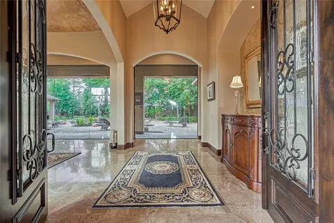 a kitchen with stainless steel appliances granite countertop a sink and cabinets