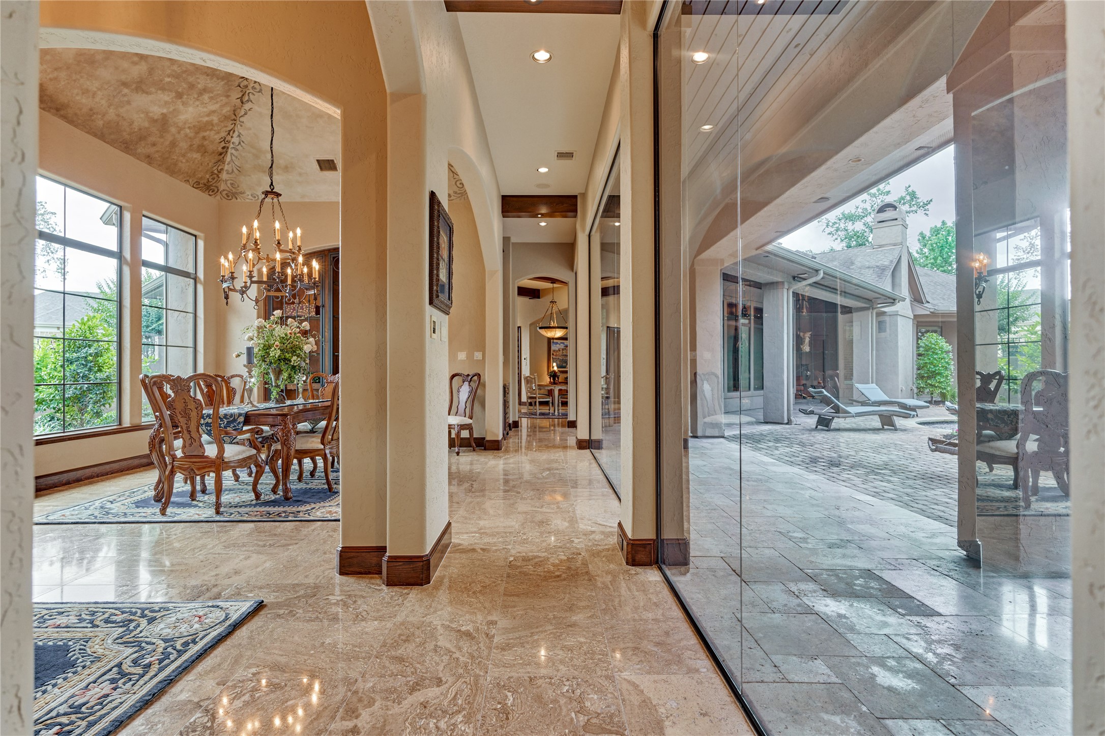 24803 Pearl Crest Lane Spring, TX 77389 - Photo 9 of 50 Expansive floor-to-ceiling windows bring the outdoors in—offering a truly tranquil lifestyle.