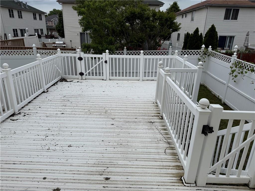 7 Georgetown Lane Brooklyn, NY 11234 - Photo 13 of 32 a view of a house with wooden deck