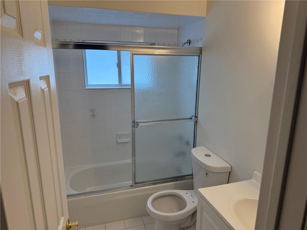 7 Georgetown Lane Brooklyn, NY 11234 - Photo 17 of 32 a bathroom with a toilet and shower