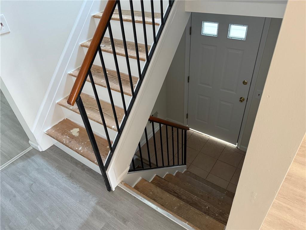 7 Georgetown Lane Brooklyn, NY 11234 - Photo 23 of 32 a view of staircase with railing and white walls