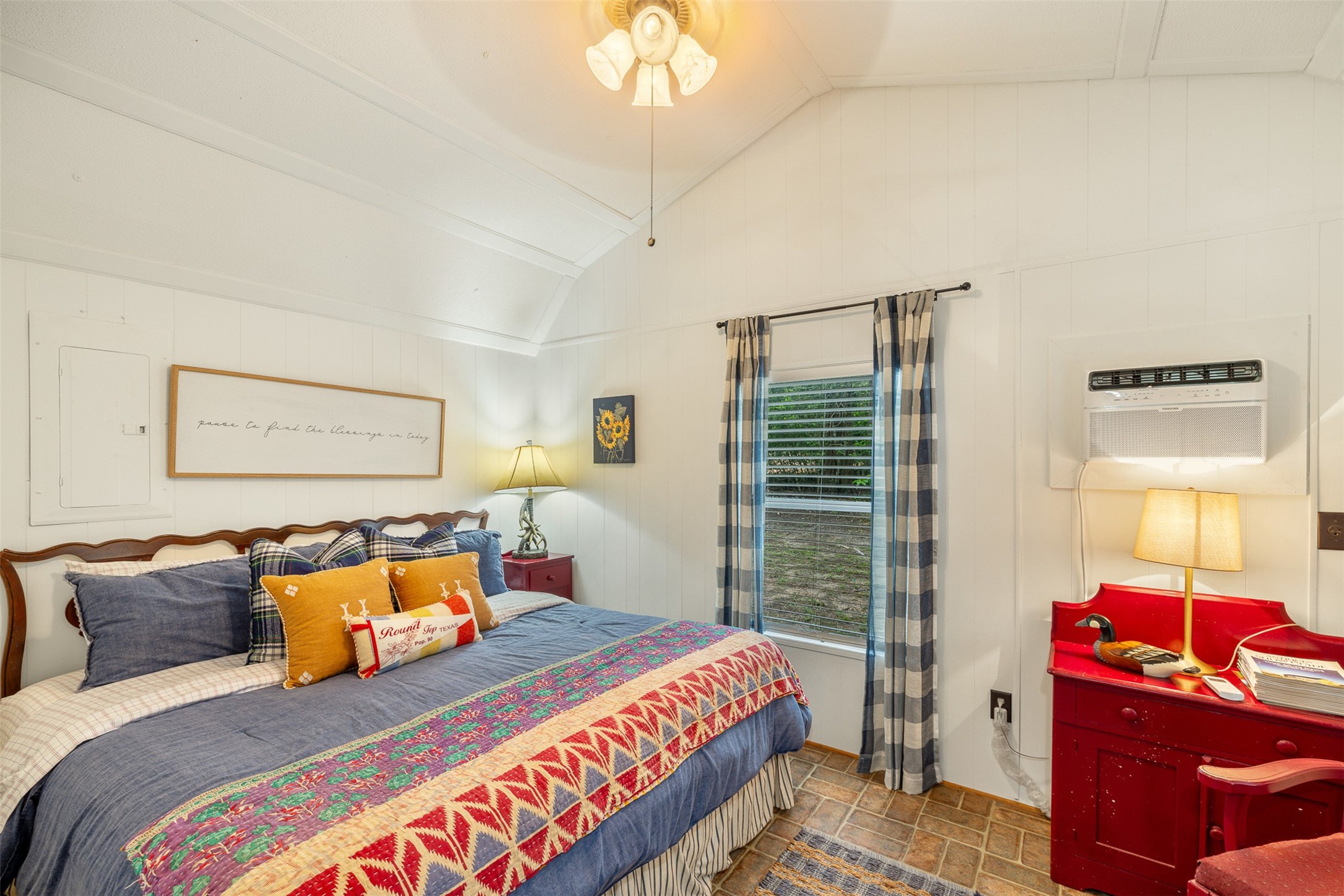 10900 Mayer Cemetery Road Burton, TX 77835 - Photo 19 of 24 a bedroom with a bed and wooden floor