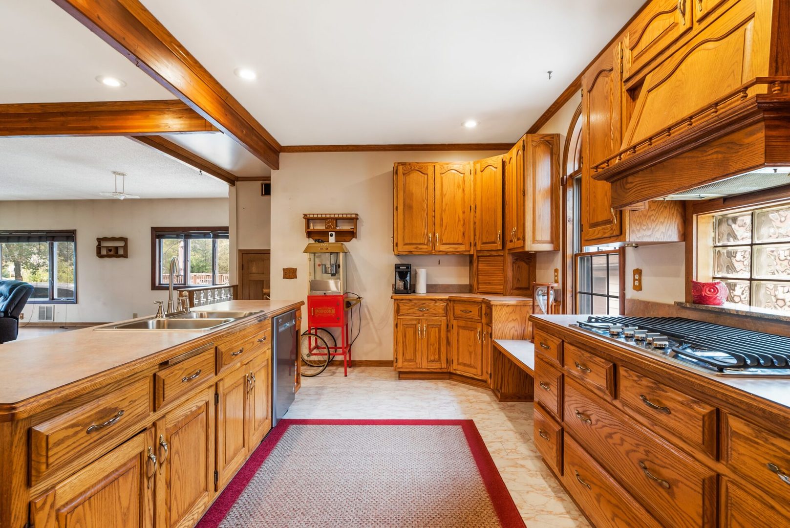 25123 South Chicago Road Elwood, IL 60421 - Photo 12 of 42 a large kitchen with stainless steel appliances granite countertop a lot of counter space and a large window