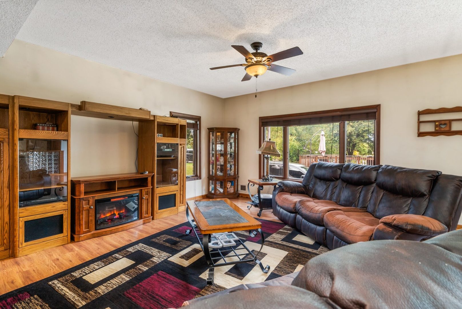 25123 South Chicago Road Elwood, IL 60421 - Photo 17 of 42 a living room with furniture fireplace and flat screen tv