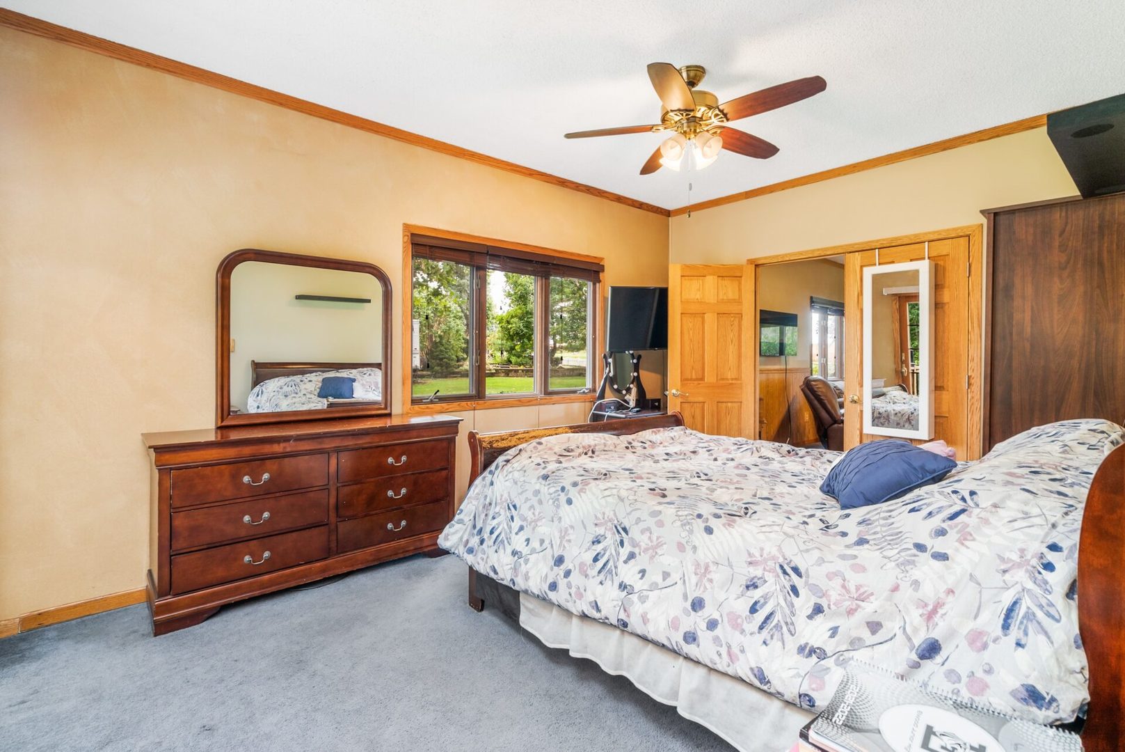 25123 South Chicago Road Elwood, IL 60421 - Photo 18 of 42 a bedroom with a bed and a dresser