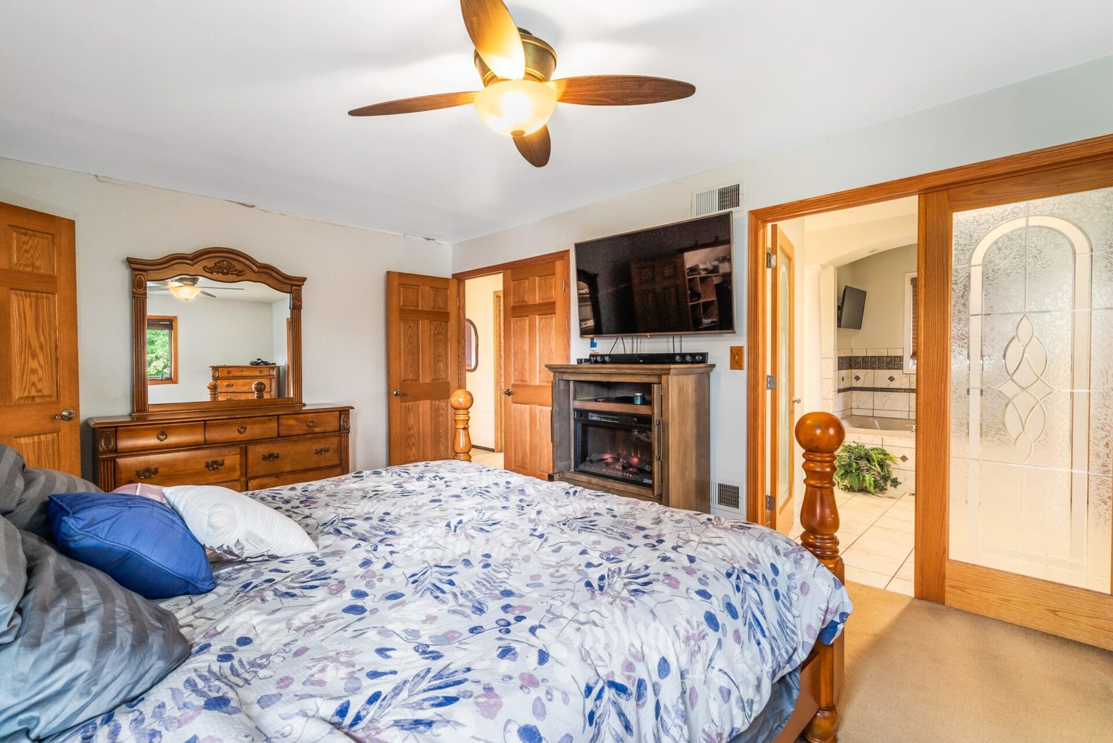 25123 South Chicago Road Elwood, IL 60421 - Photo 22 of 42 a bedroom with a bed and a television