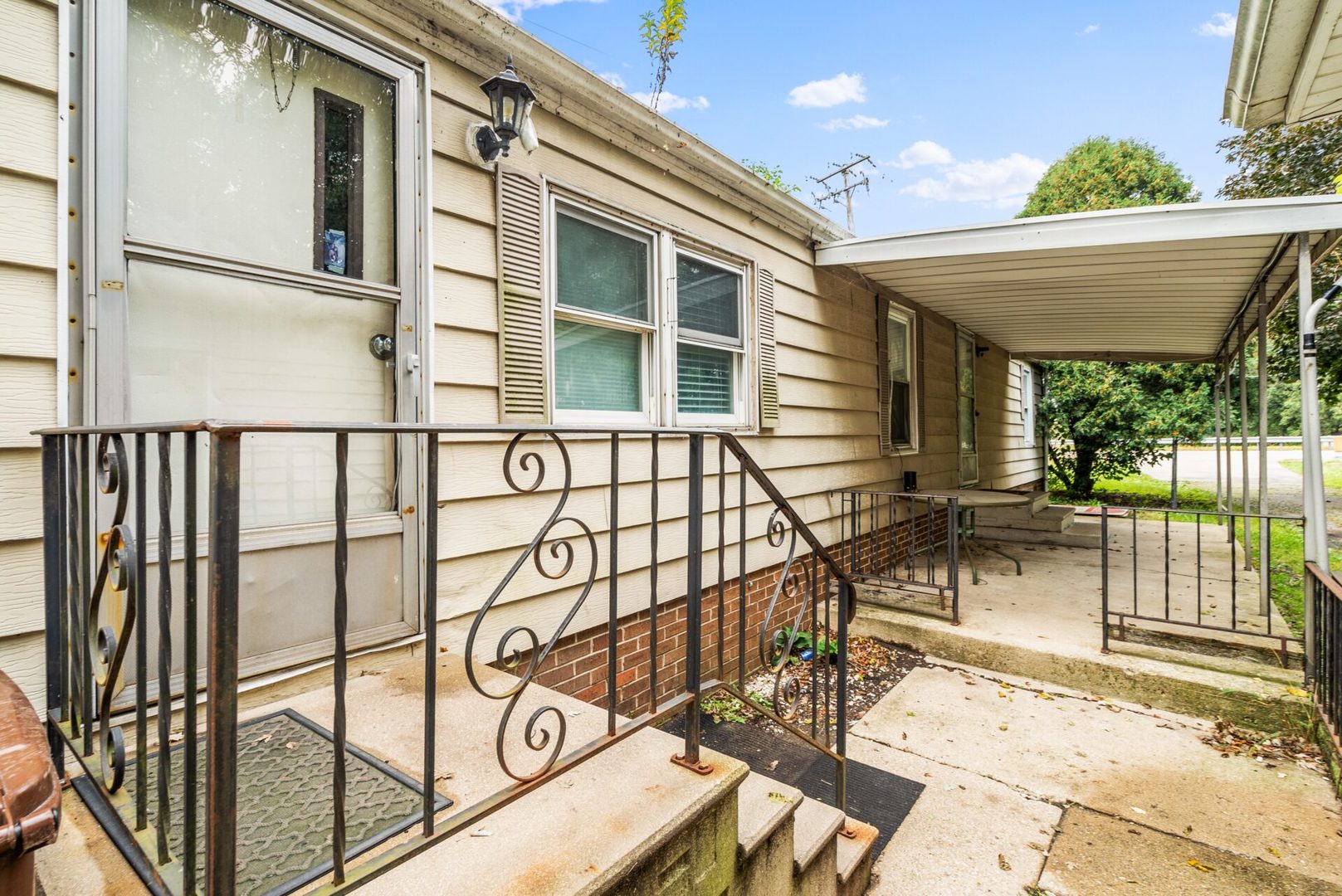 25123 South Chicago Road Elwood, IL 60421 - Photo 37 of 42 a view of a porch with a bench