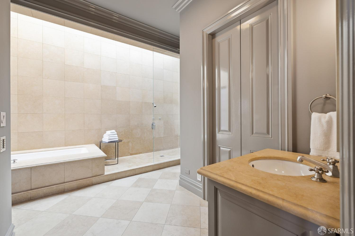 2480 Broadway San Francisco, CA 94115 - Photo 32 of 70 a bathroom with a sink and a mirror