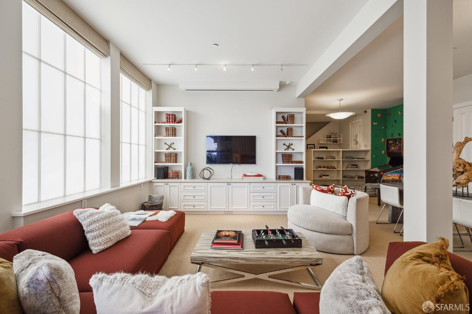 2480 Broadway San Francisco, CA 94115 - Photo 48 of 70 a living room with furniture a flat screen tv and a large window