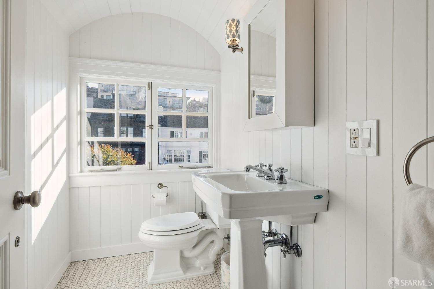 2480 Broadway San Francisco, CA 94115 - Photo 55 of 70 a bathroom with a sink a toilet and shower