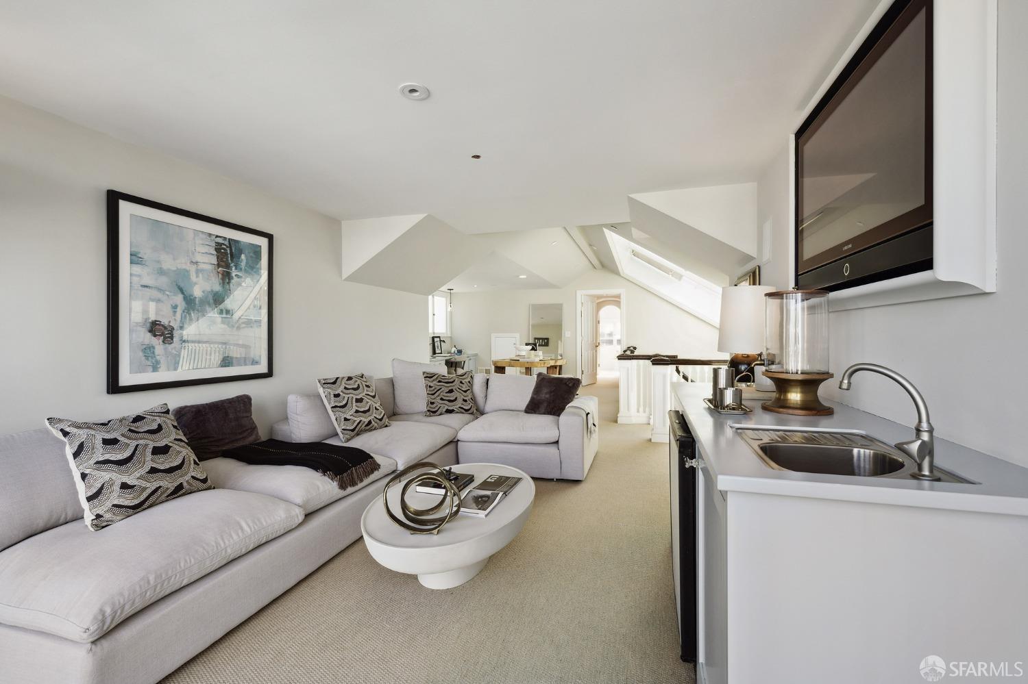 2480 Broadway San Francisco, CA 94115 - Photo 60 of 70 a living room with furniture and a flat screen tv