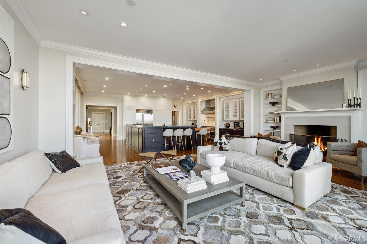 2480 Broadway San Francisco, CA 94115 - Photo 7 of 70 a living room with furniture a rug and a fireplace