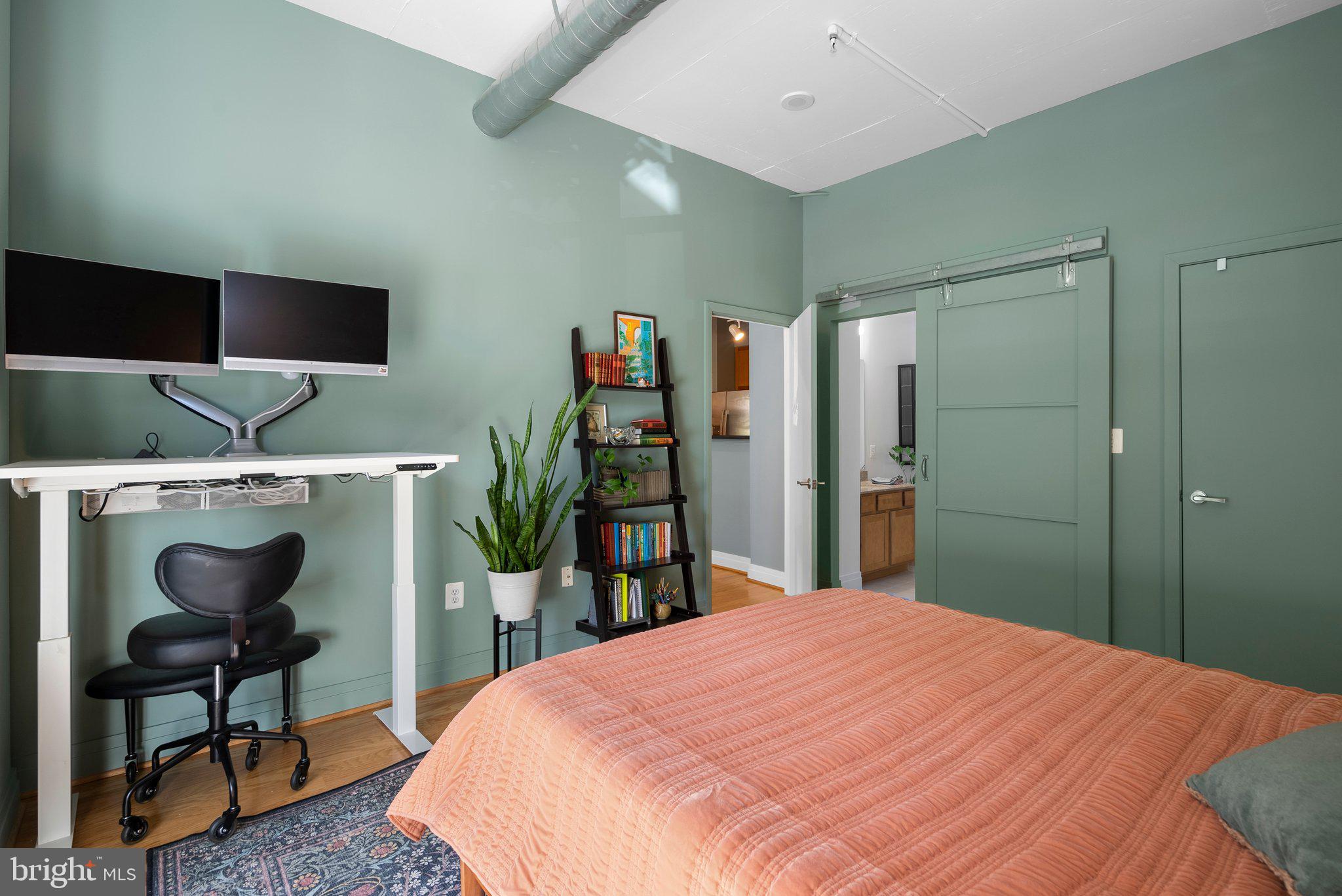 2020 12th Street Northwest, Unit 108 Washington, DC 20009 - Photo 18 of 35 Primary bath w/ barn door & custom walk-in closet