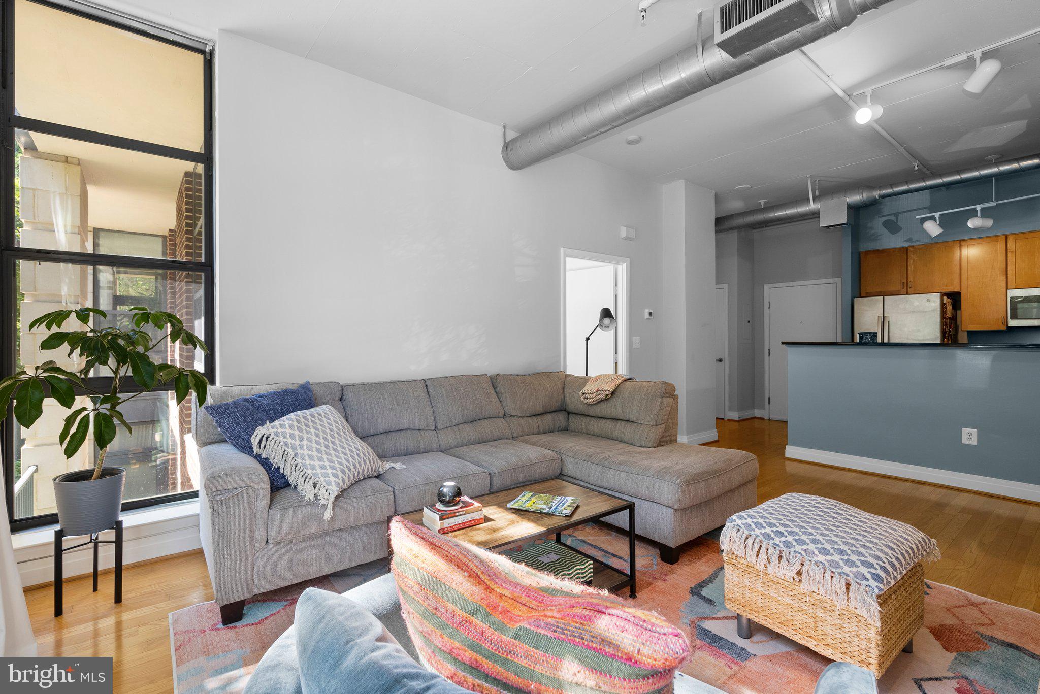 2020 12th Street Northwest, Unit 108 Washington, DC 20009 - Photo 9 of 35 Great room for relaxing, dining and entertaining