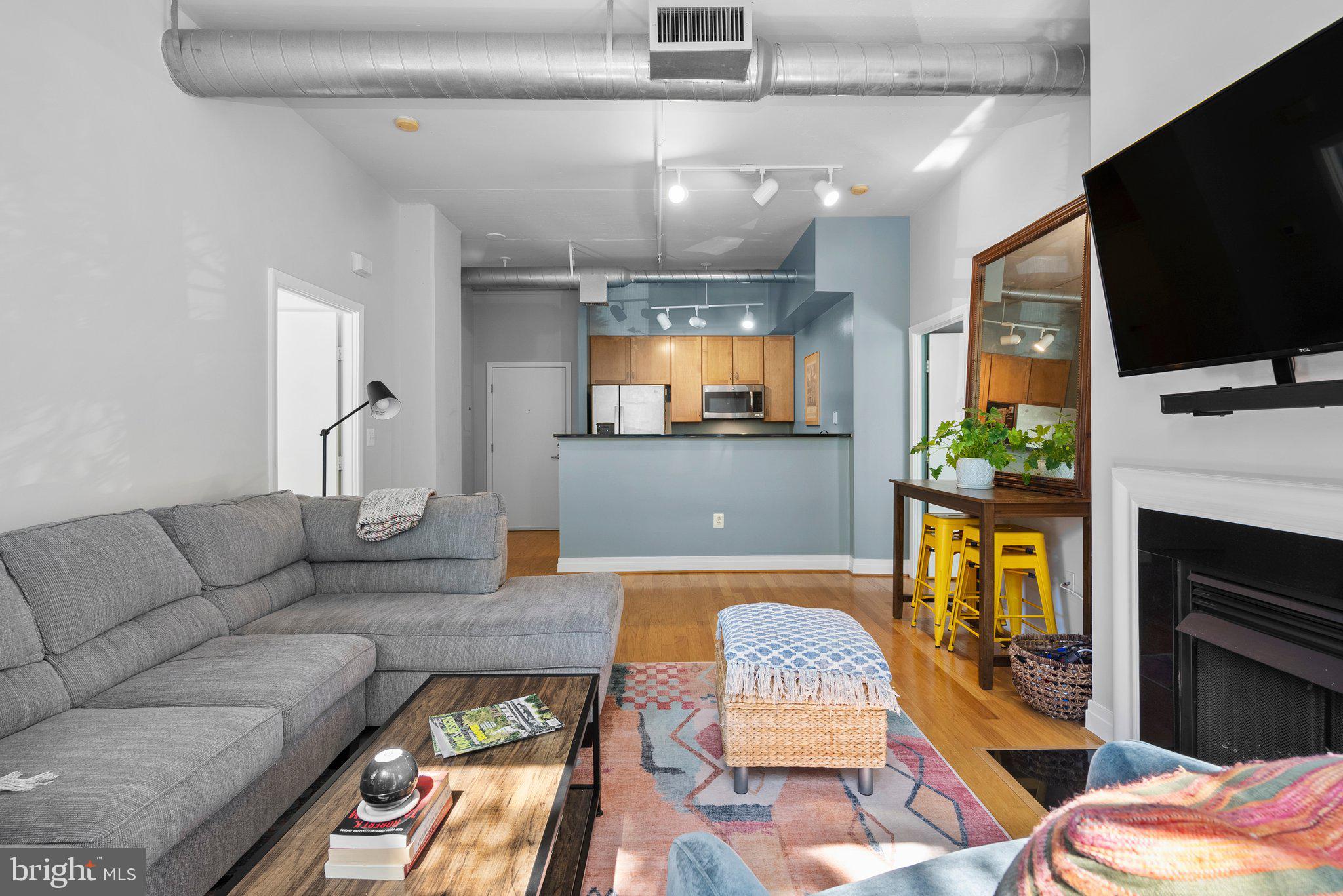 2020 12th Street Northwest, Unit 108 Washington, DC 20009 - Photo 10 of 35 Great room for relaxing, dining and entertaining