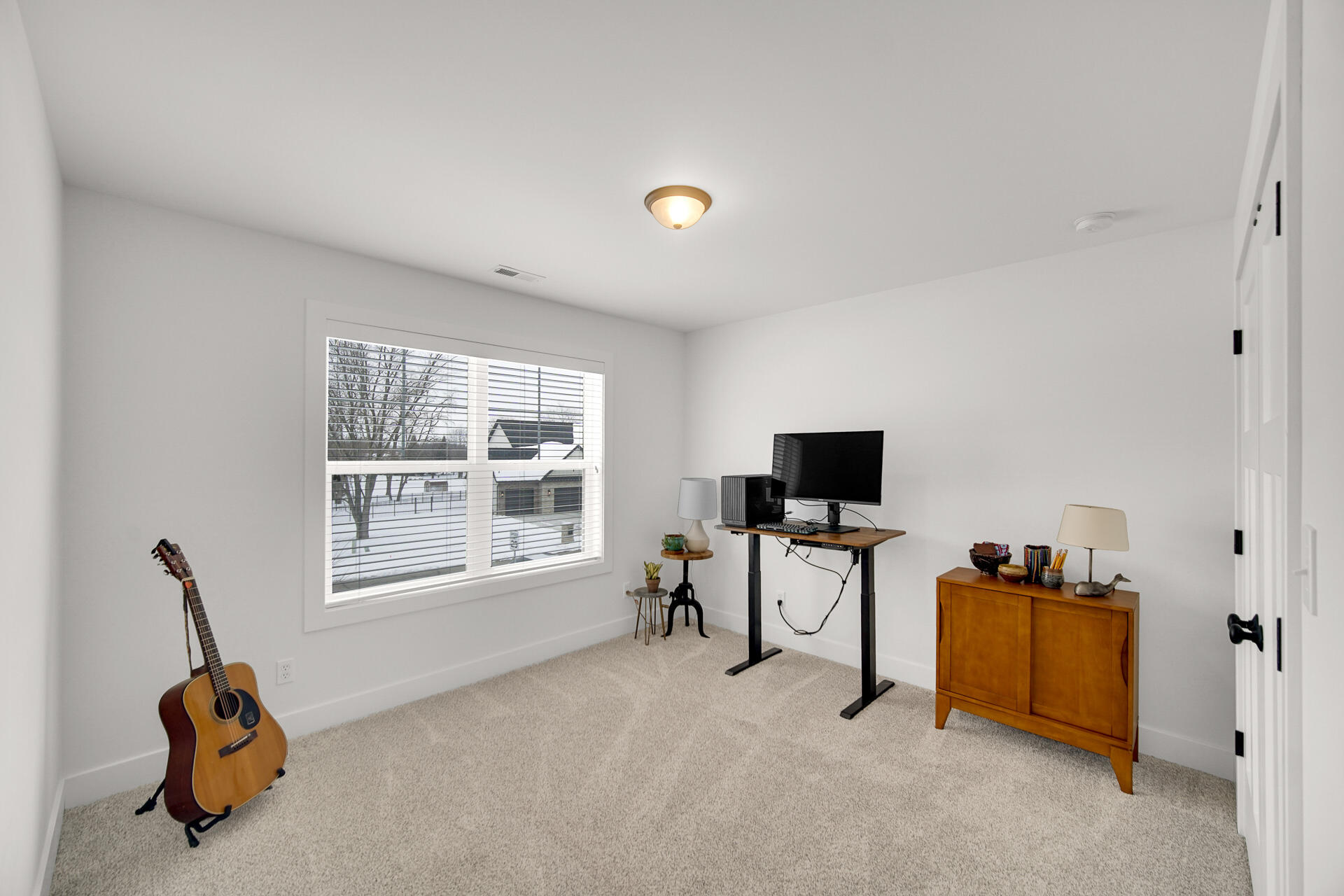 1079 Kleven Lane Crown Point, IN 46307 - Photo 29 of 37 a living room with furniture and a flat screen tv