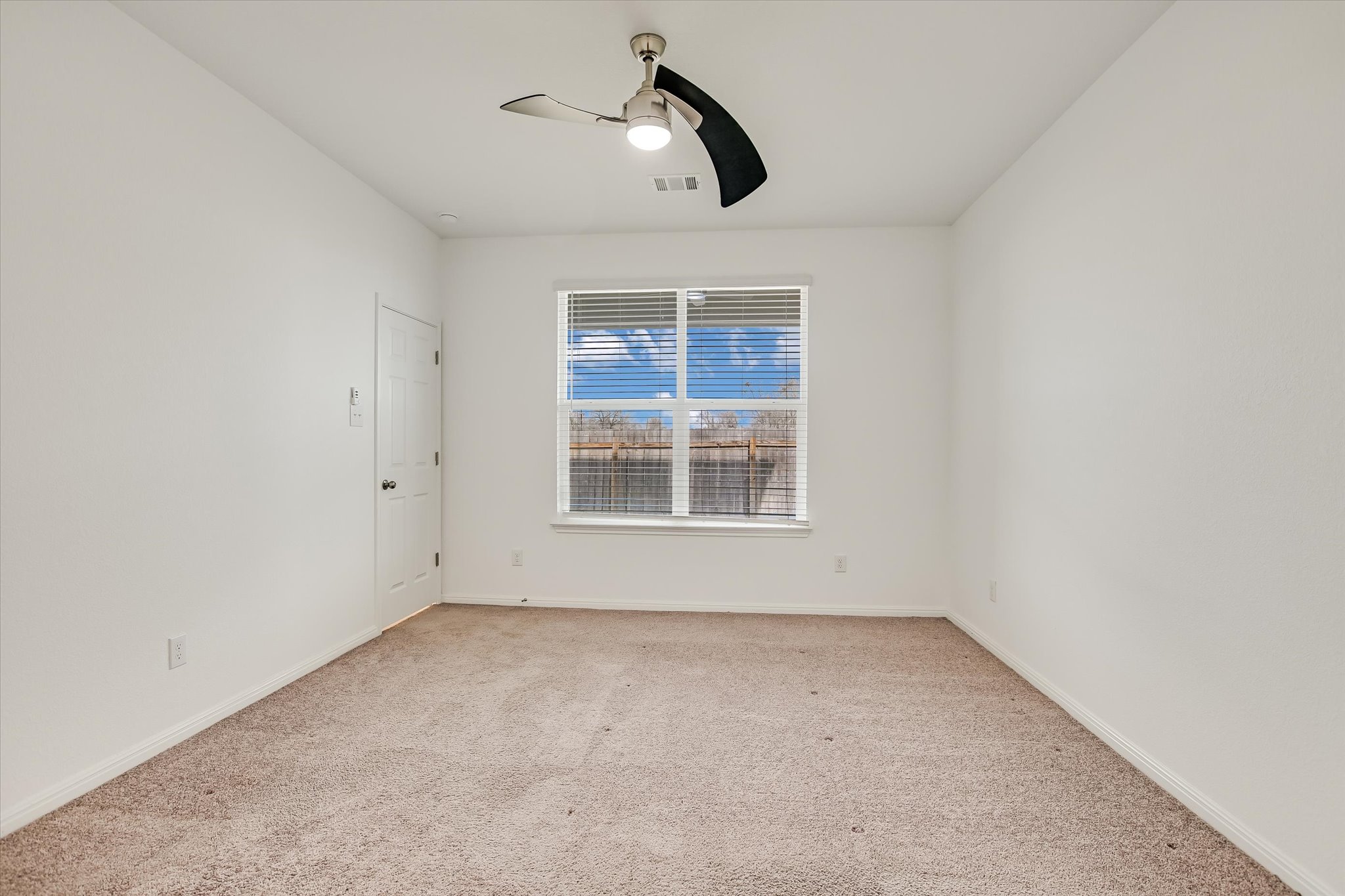 12814 Meachum Lane Manor, TX 78653 - Photo 11 of 20 an empty room with a window