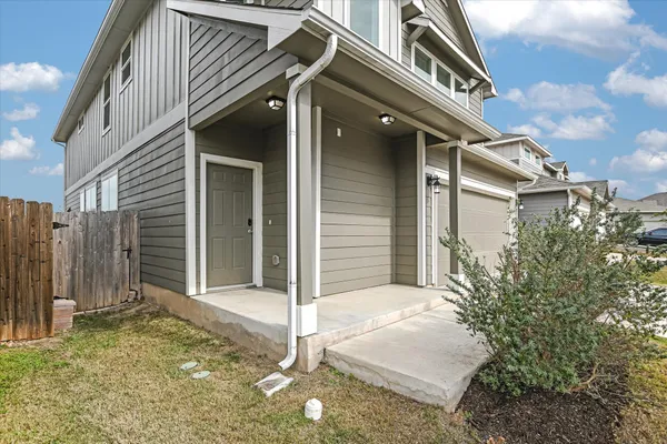 a front view of a house with a garage