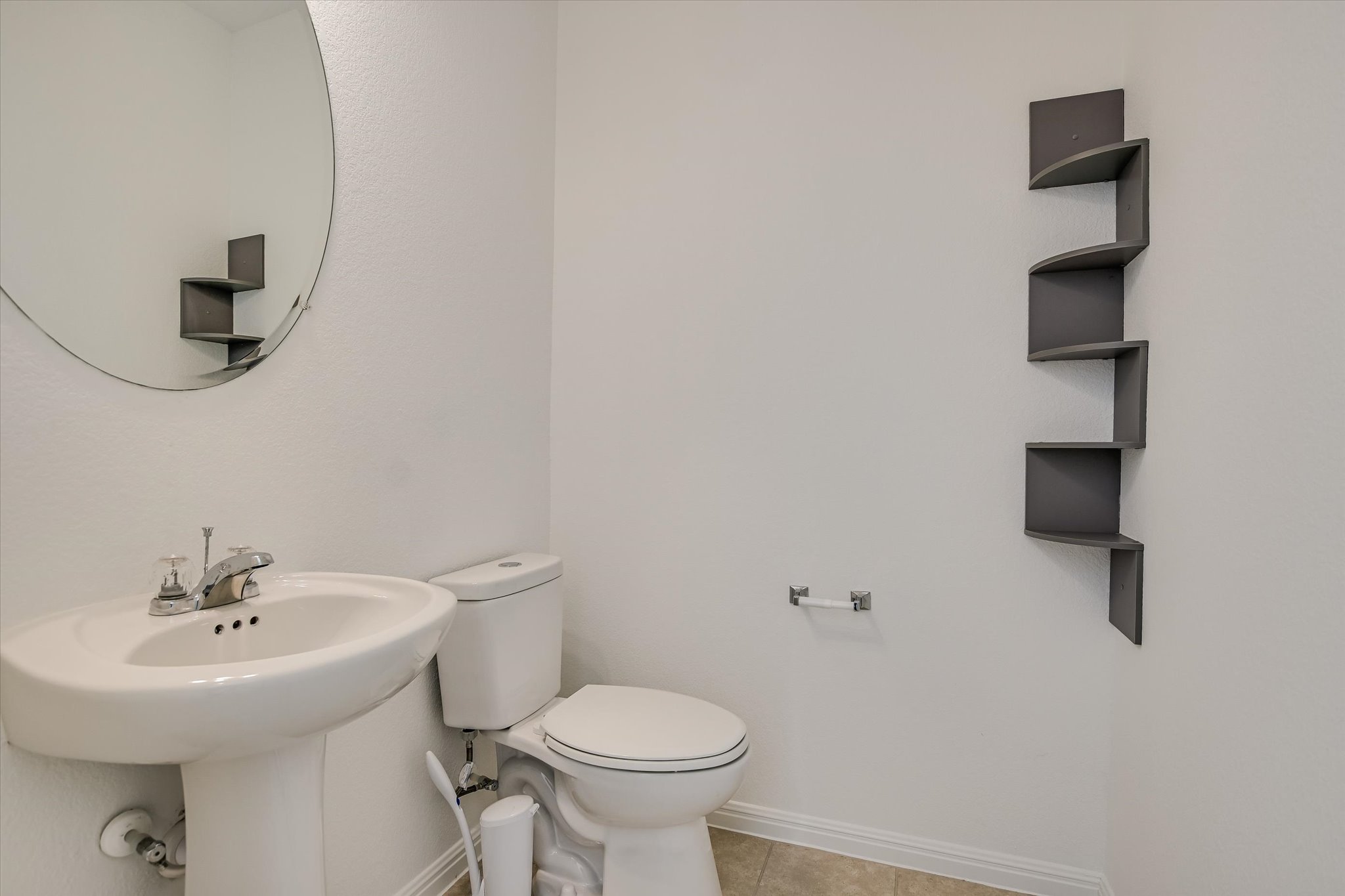 12814 Meachum Lane Manor, TX 78653 - Photo 9 of 20 a bathroom with a sink toilet and a mirror