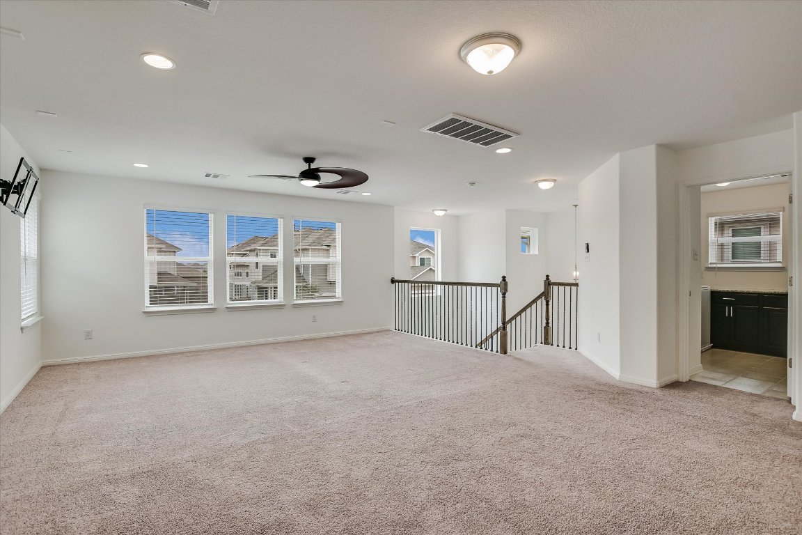 12814 Meachum Lane Manor, TX 78653 - Photo 10 of 20 a view of an empty room with a window