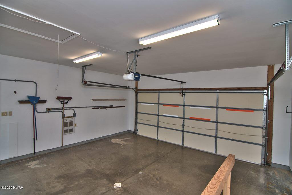63 Callapoose Road Moscow, PA 18444 - Photo 49 of 73 a view of a garage with stairs
