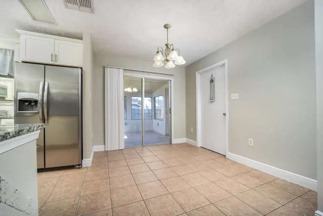 a view of a kitchen with windows