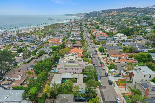 an aerial view of a city with lots of residential buildings