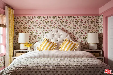 a bathroom with a toilet sink and shower