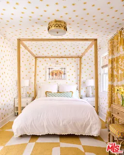 a dining room with a table and chairs