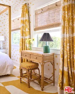 a living room with a couch and a table