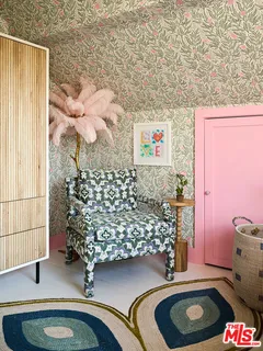 a view of a chairs and table in the patio