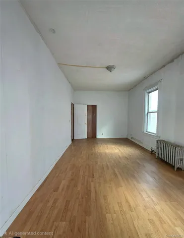 a view of an empty room and window