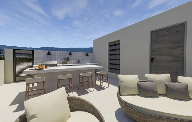 a kitchen with a table and chairs in it