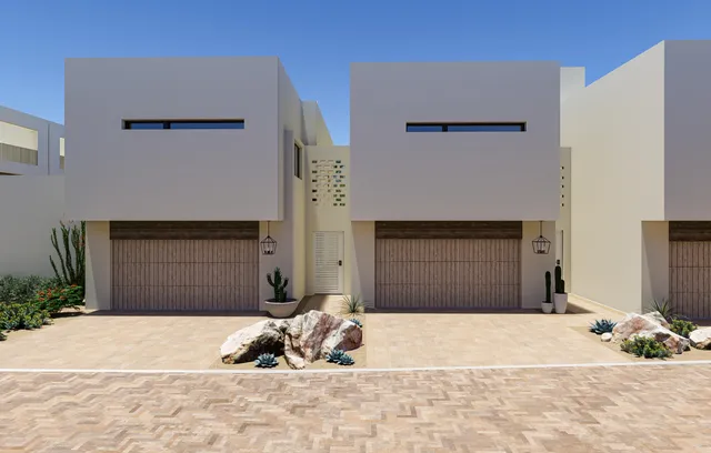 a view of a building with potted plants