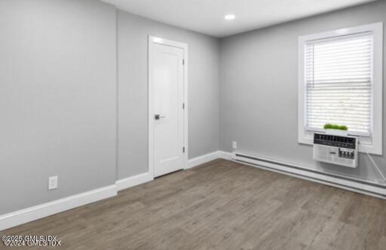 168 North Water Street, Unit 2L Greenwich, CT 06830 - Photo 6 of 11 a view of an empty room with a window