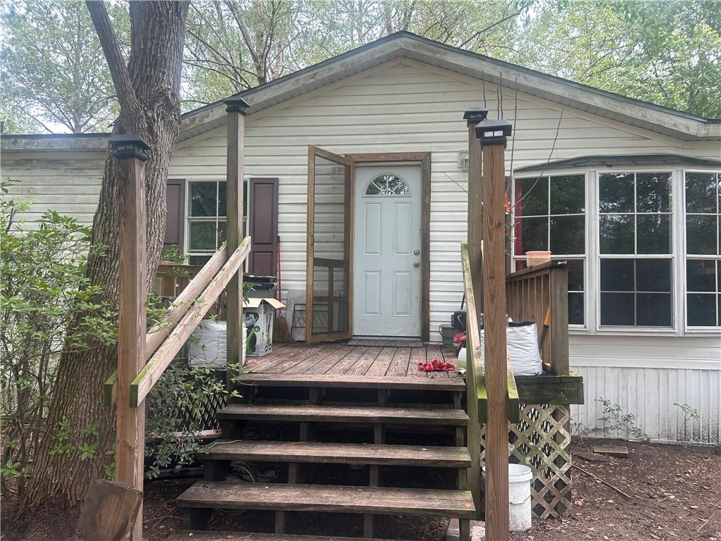 a front view of house with stairs