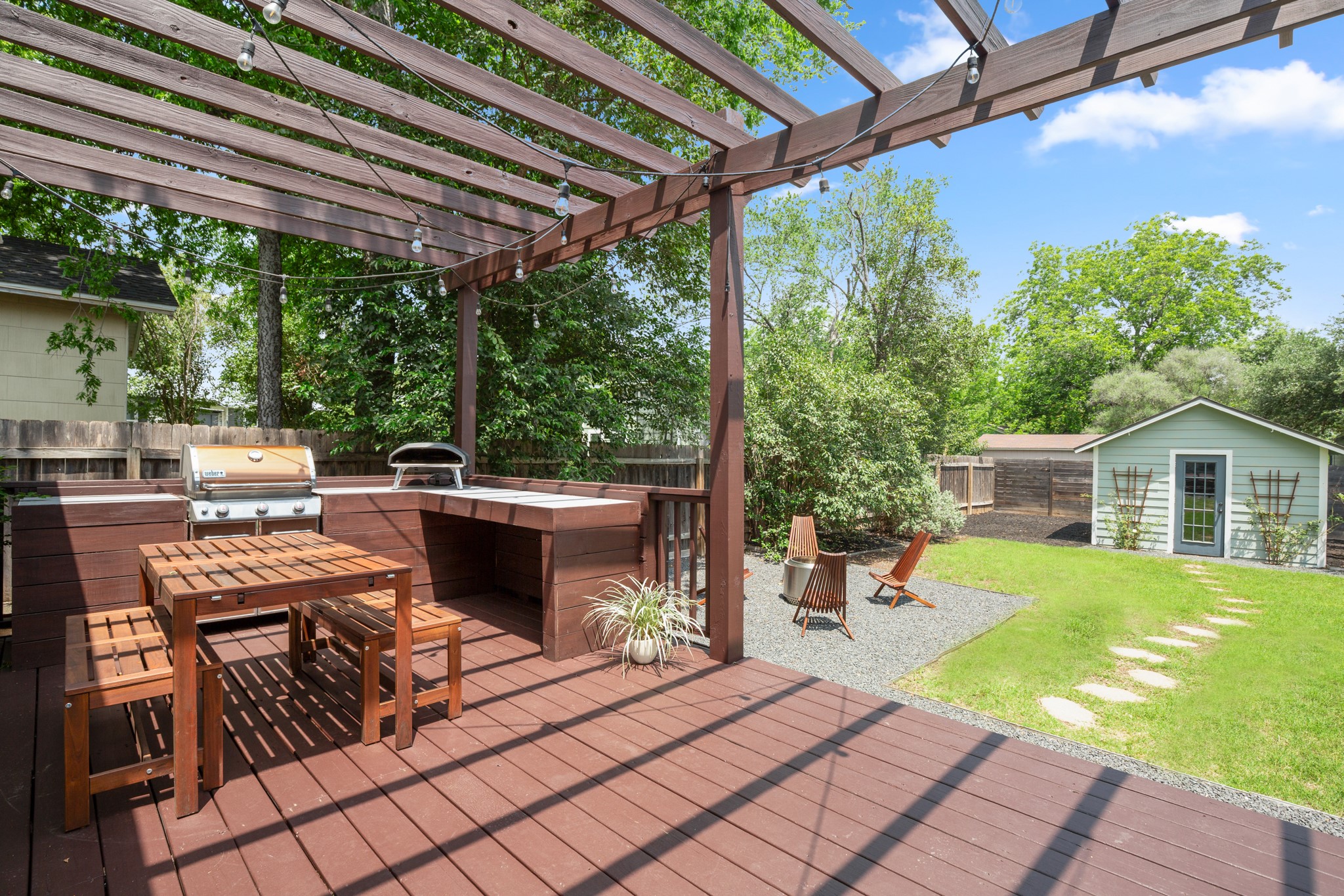2010 Alegria Road Austin, TX 78757 - Photo 26 of 35 Expansive wood-finish deck with an integrated pergola