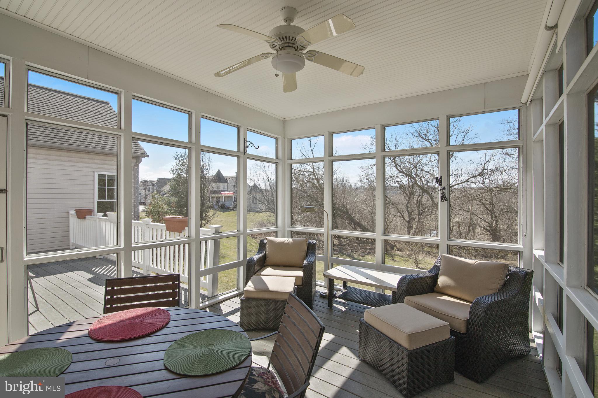 2649 Brook Valley Road Frederick, MD 21701 - Photo 16 of 30 screen deck off kitchen with view to sun porch