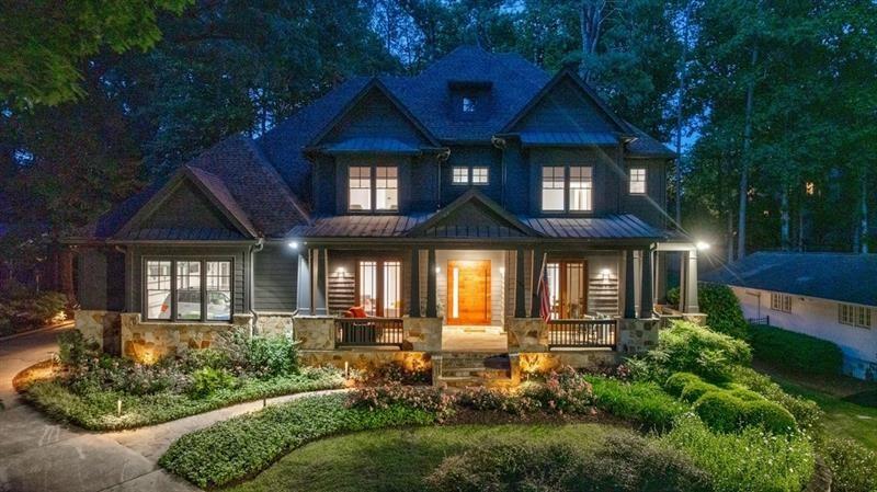 3117 West Roxboro Road Northeast Atlanta, GA 30324 - Photo 2 of 78 a front view of a house with a yard