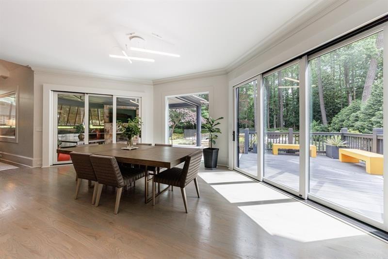 3117 West Roxboro Road Northeast Atlanta, GA 30324 - Photo 24 of 78 a view of a dining room with furniture window and outside view